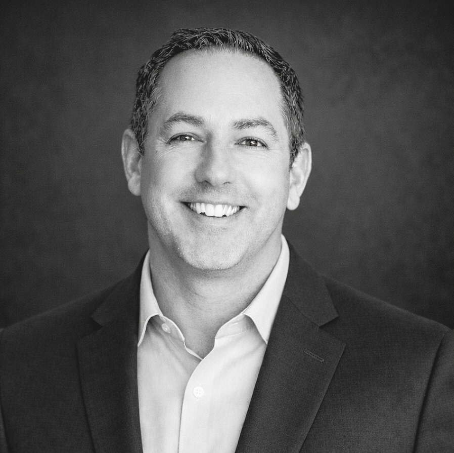 photo of corey reid in a professional suit